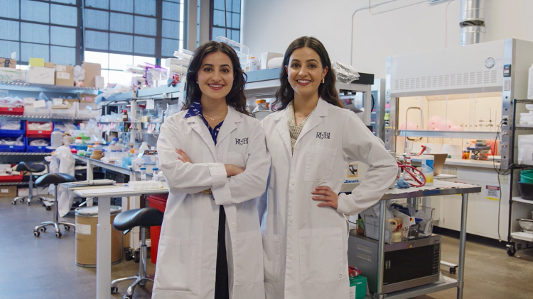 Symbiotic manufacturing could breathe fresh air into supply chains Co-Founders of Rubi Labs standing in white lab coats in a research laboratory,