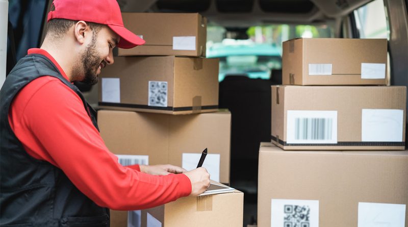Image of a delivery man with numerous brown packages in the back of a van to support pick-up and delivery services article