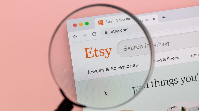 Image of a screen showing the Etsy website, with a magnifying glass over the logo to support Esty personalized gifts article