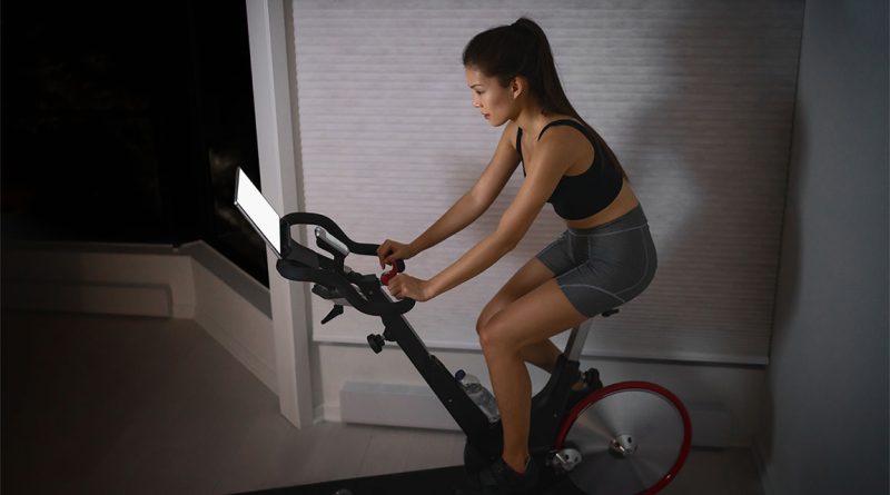 Peloton’s new AI-enabled Bike+ in a modern home gym setting