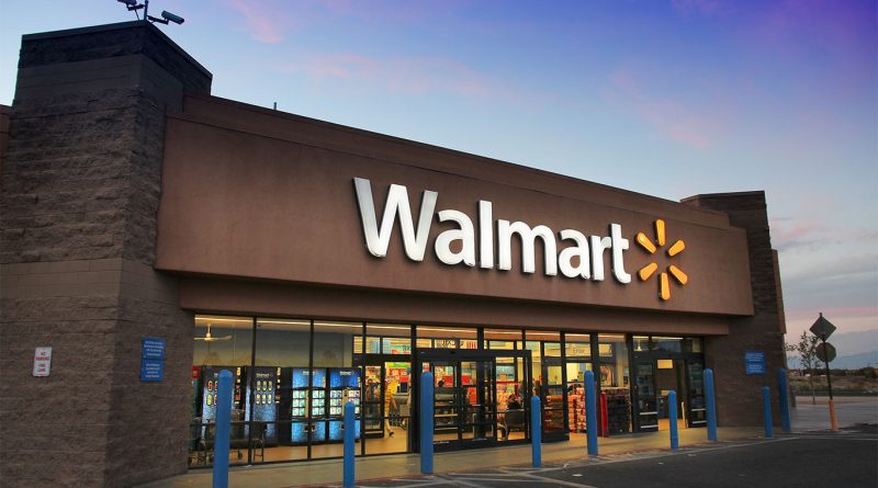 Customer using the Walmart app in-store to find holiday deals with AI-powered tools