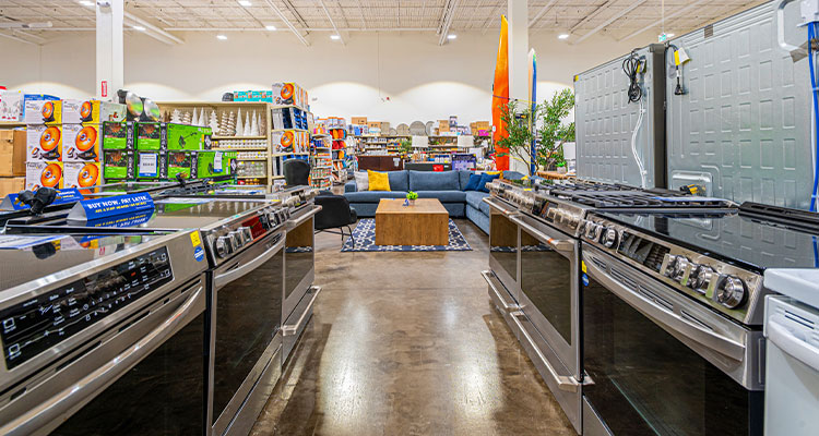 Enter the world of Big Box Outlet Store, where customers find unexpected bargains and unrivalled value A range of ovens in a Big Box Outlet Store