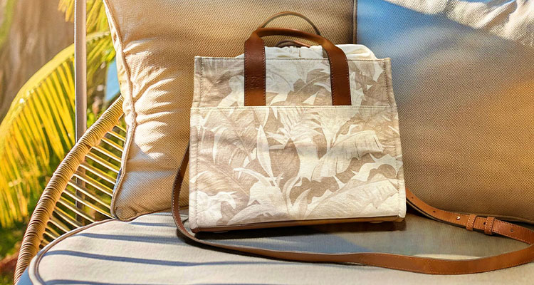 2026 will bring continuous launches of major fashion partnerships for Concept One Accessories a Tommy Bahama Leather Trim Medium Floral Tote bag