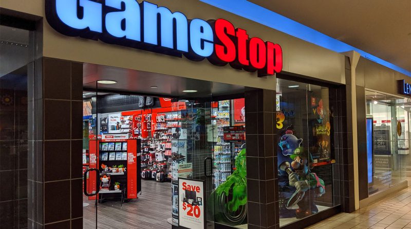 A shuttered GameStop retail storefront with "Closing" signs in the window, reflecting the shift from physical to digital gaming