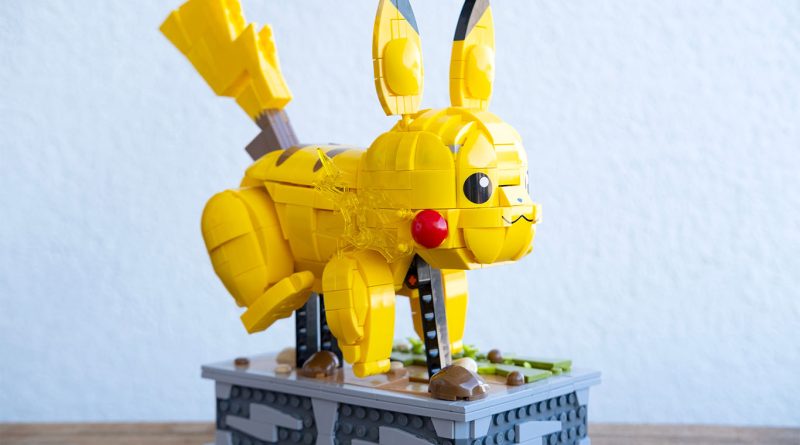 LEGO Pokémon set featuring Pikachu jumping from a Poké Ball with other brick Pokémon in background